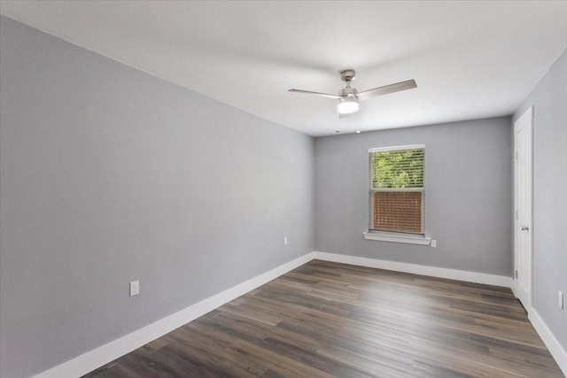 3015 S Fannin Ave, Denison, TX 75021 - empty room with baseboards, ceiling fan, and dark wood finished floors