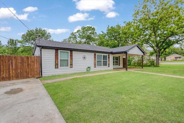 3015 S Fannin Ave, Denison, TX 75021 - single story home featuring a carport