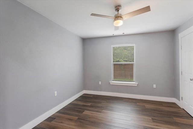 3015 S Fannin Ave, Denison, TX 75021 - spare room featuring a ceiling fan, baseboards, and dark wood-style flooring