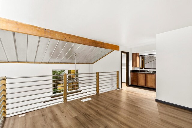 3103 Wycliff Ave, Dallas, TX 75219 - bonus room with light wood-type flooring and baseboards