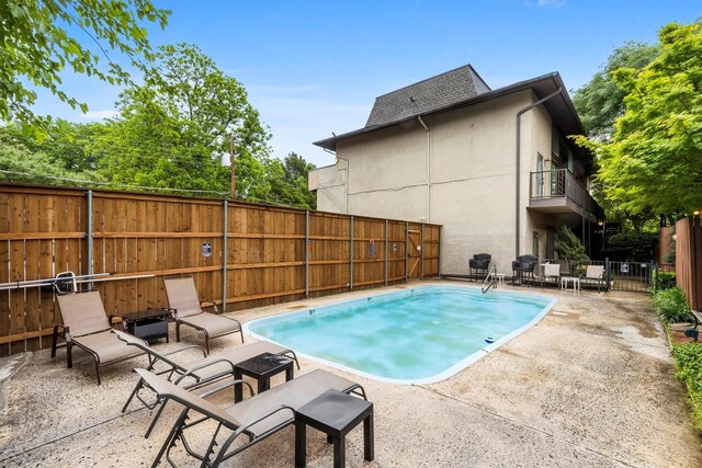 3103 Wycliff Ave, Dallas, TX 75219 - view of pool with fence and a patio area