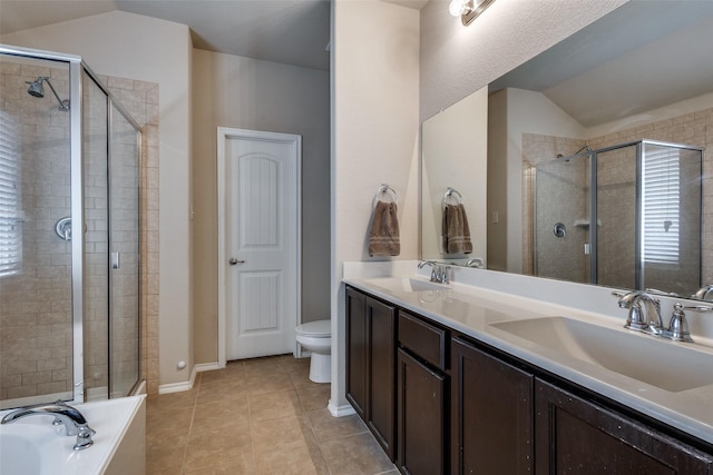 2044 Meadow Park Dr, Princeton, TX 75407 - bathroom with lofted ceiling, a shower stall, tile patterned flooring, double vanity, and toilet