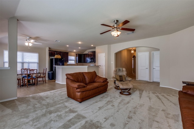 2044 Meadow Park Dr, Princeton, TX 75407 - living area featuring ceiling fan, arched walkways, light carpet, plenty of natural light, and recessed lighting