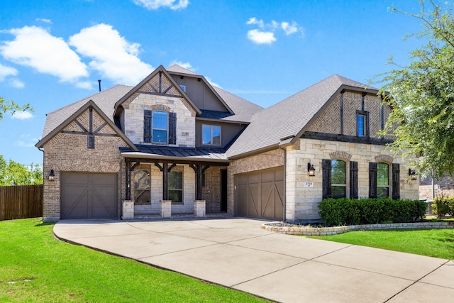 view of front of house with concrete driveway, stone siding, a shingled roof, and a standing seam roof