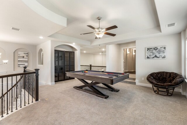 rec room with a tray ceiling, carpet flooring, baseboards, ceiling fan, and recessed lighting