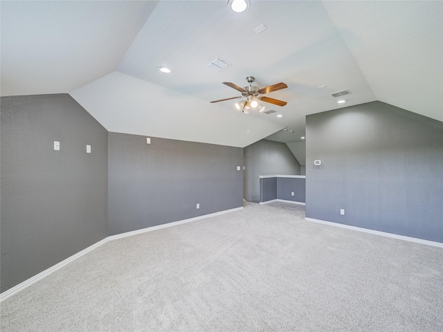 bonus room featuring vaulted ceiling, ceiling fan, recessed lighting, carpet floors, and baseboards
