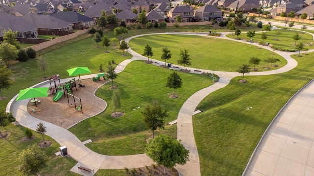 view of property location featuring a community park and nearby suburban area