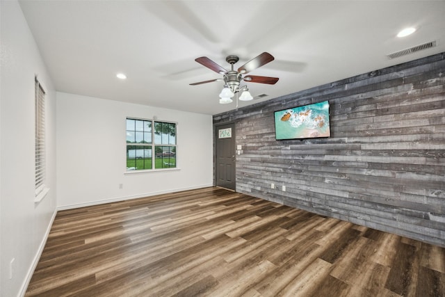 182 Willowcreek Ln, Rockwall, TX 75032 - empty room featuring ceiling fan, wood finished floors, an accent wall, recessed lighting, and baseboards