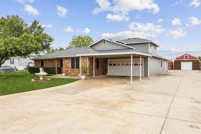 182 Willowcreek Ln, Rockwall, TX 75032 - traditional home featuring concrete driveway, a front yard, a garage, brick siding, and roof with shingles