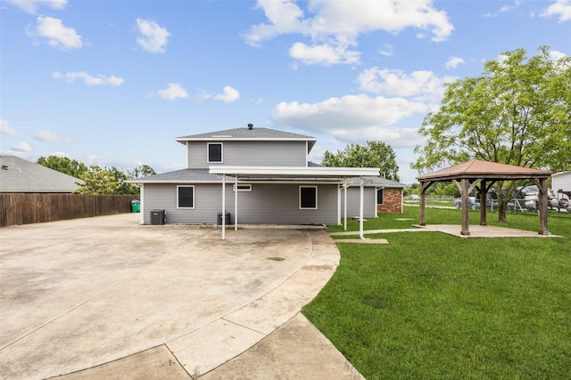 182 Willowcreek Ln, Rockwall, TX 75032 - rear view of house featuring a gazebo, a patio, cooling unit, driveway, and a shingled roof