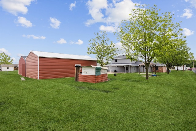 182 Willowcreek Ln, Rockwall, TX 75032 - view of green lawn featuring an outbuilding and a pole building