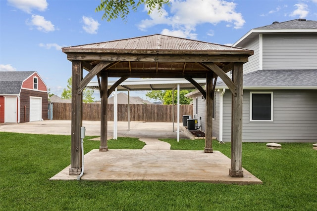 182 Willowcreek Ln, Rockwall, TX 75032 - view of patio / terrace featuring an outbuilding, a detached garage, a gazebo, and a storage shed