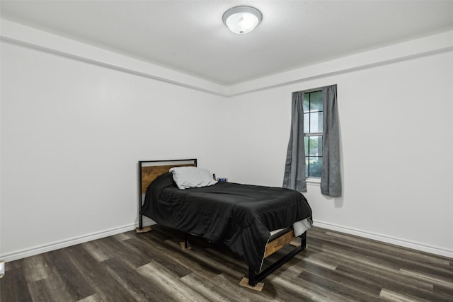 182 Willowcreek Ln, Rockwall, TX 75032 - bedroom featuring dark wood finished floors and baseboards