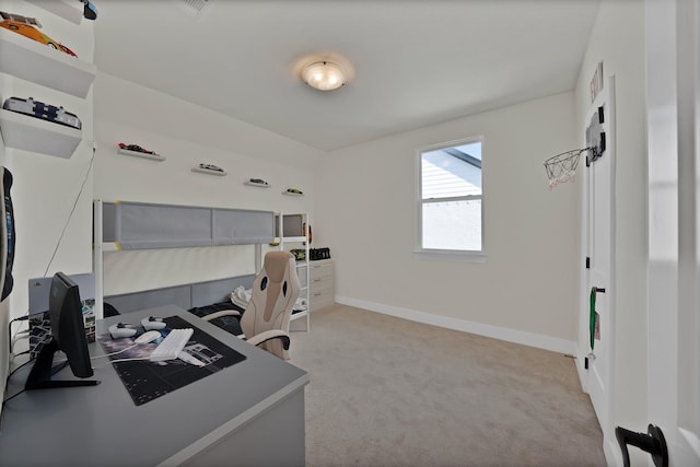 home office featuring carpet flooring and baseboards