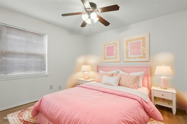 1021 Irene St, Burleson, TX 76028 - bedroom featuring wood finished floors and ceiling fan