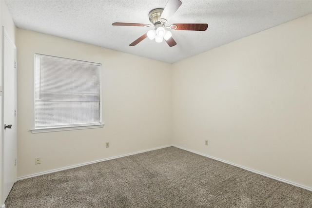 1021 Irene St, Burleson, TX 76028 - empty room with carpet floors, a ceiling fan, a textured ceiling, and baseboards