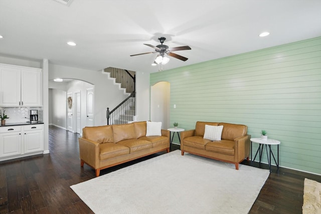 3200 Hawks View Ln, Denton, TX 76208 - living area with arched walkways, stairs, dark wood finished floors, a ceiling fan, and recessed lighting