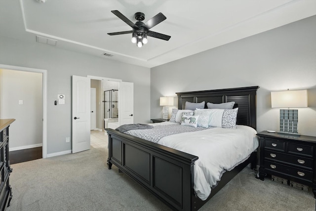 3200 Hawks View Ln, Denton, TX 76208 - bedroom featuring light carpet, ensuite bath, and a ceiling fan