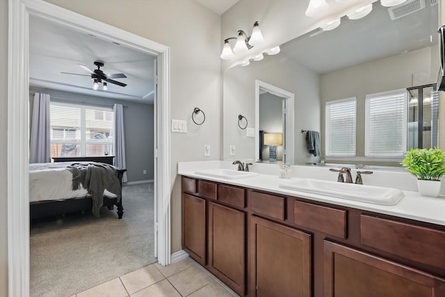 3200 Hawks View Ln, Denton, TX 76208 - bathroom featuring connected bathroom, double vanity, tile patterned flooring, and ceiling fan