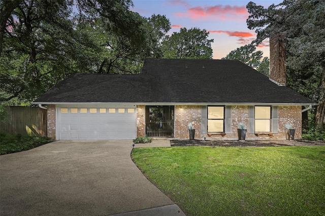 1738 Northaven Ct, Arlington, TX 76012 - mid-century modern home featuring concrete driveway, brick siding, a garage, and a chimney