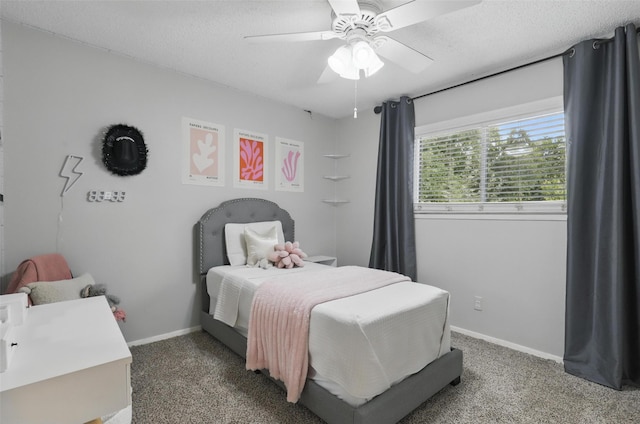 1738 Northaven Ct, Arlington, TX 76012 - carpeted bedroom with baseboards, ceiling fan, and a textured ceiling