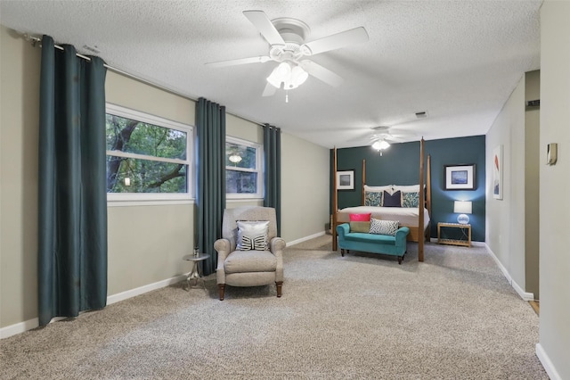 1738 Northaven Ct, Arlington, TX 76012 - carpeted bedroom with a textured ceiling, a ceiling fan, and baseboards