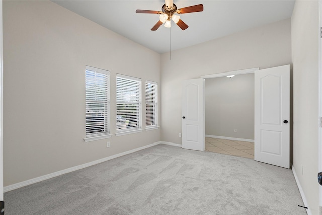 6328 Pinionpark Way, Fort Worth, TX 76179 - unfurnished bedroom featuring carpet, baseboards, a ceiling fan, and tile patterned floors