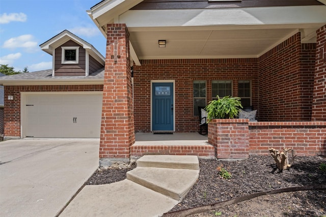 6328 Pinionpark Way, Fort Worth, TX 76179 - property entrance with brick siding, concrete driveway, and a garage