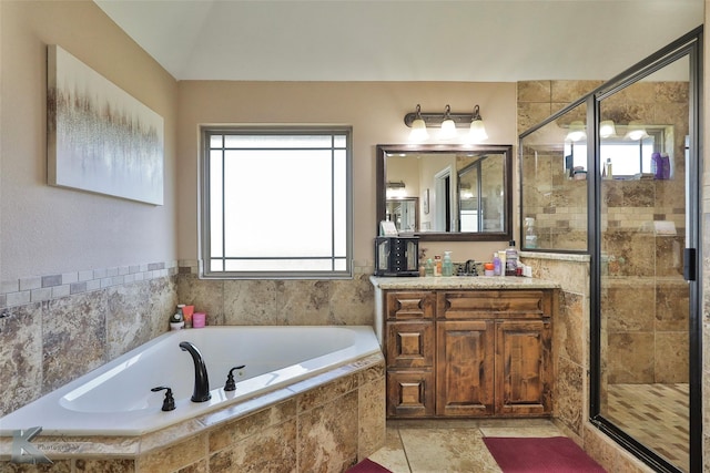 3726 Enchanted Rock Rd, Abilene, TX 79606 - bathroom with a stall shower, a garden tub, and vanity