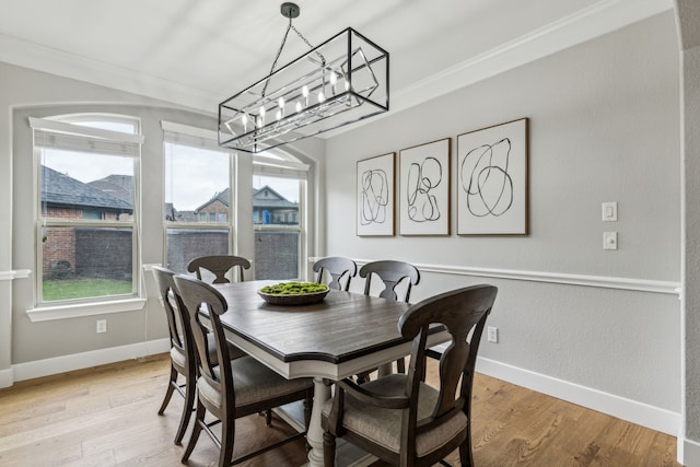2831 Sheffield Ct, Trophy Club, TX 76262 - dining space featuring a chandelier, ornamental molding, light wood-style floors, and baseboards