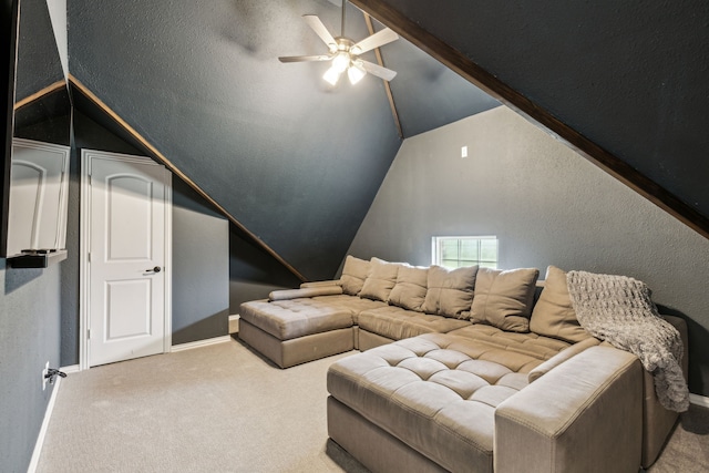 2831 Sheffield Ct, Trophy Club, TX 76262 - carpeted cinema room featuring lofted ceiling, a ceiling fan, baseboards, and a textured wall