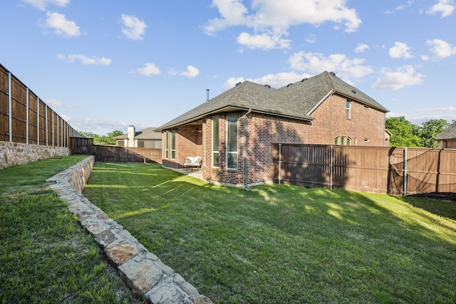 2831 Sheffield Ct, Trophy Club, TX 76262 - rear view of house featuring brick siding, a patio area, and roof with shingles