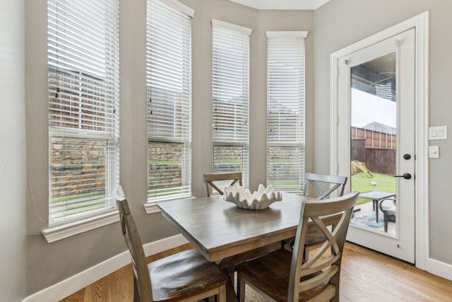 2831 Sheffield Ct, Trophy Club, TX 76262 - dining space with baseboards and light wood-style floors