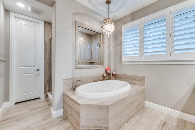 771 Drummond Dr, Prosper, TX 75078 - full bath featuring a garden tub, a shower with shower door, and baseboards