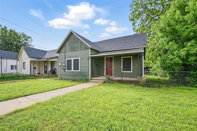 bungalow-style house featuring a porch and a shingled roof