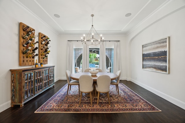 870 Swan Landing Ln, Allen, TX 75013 - dining space featuring a chandelier, wood finished floors, baseboards, and crown molding