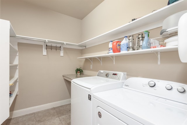 348 Terra Verde Ln, Mckinney, TX 75069 - washroom featuring baseboards, washing machine and clothes dryer, and light tile patterned floors