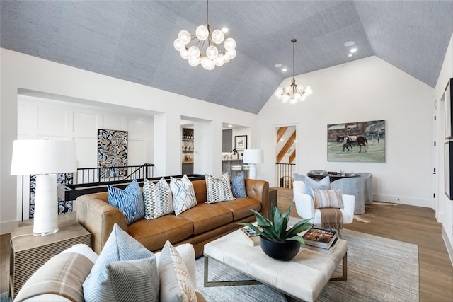 2300 Sorrelwood Ct, Celina, TX 75009 - living room featuring a chandelier, vaulted ceiling, wood finished floors, baseboards, and recessed lighting