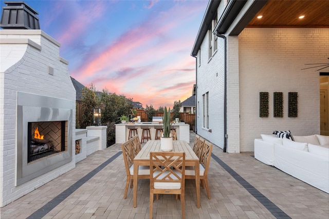 2300 Sorrelwood Ct, Celina, TX 75009 - view of patio with outdoor dining space and an outdoor living space with a fireplace