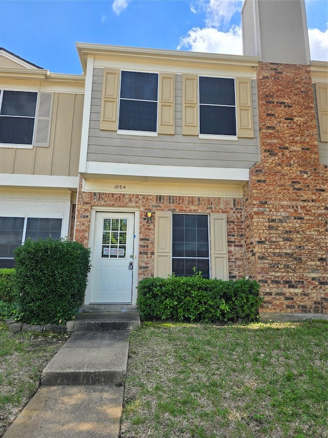 3801 14th St Unit 1004, Plano, TX 75074 - townhome / multi-family property with a front yard