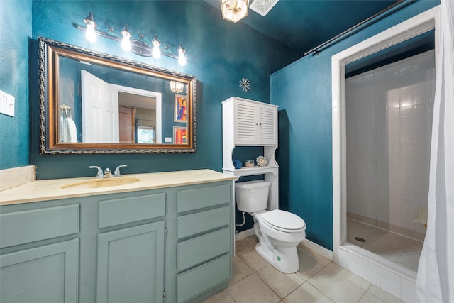 2923 Live Oak Ave, Waco, TX 76708 - bathroom with tile patterned floors, toilet, a stall shower, and vanity
