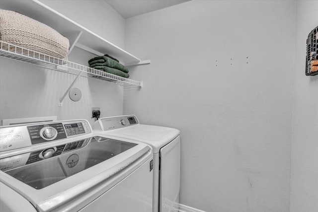 laundry room with washer and dryer
