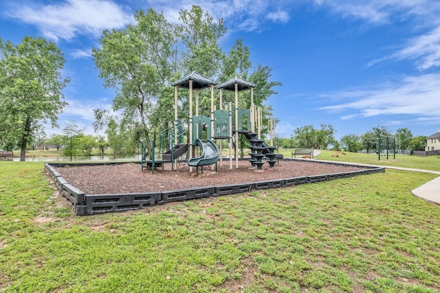 community playground featuring a lawn
