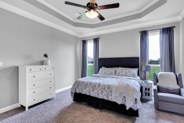 102 Willowbrook Dr, Waxahachie, TX 75165 - bedroom with carpet floors, crown molding, a tray ceiling, baseboards, and ceiling fan