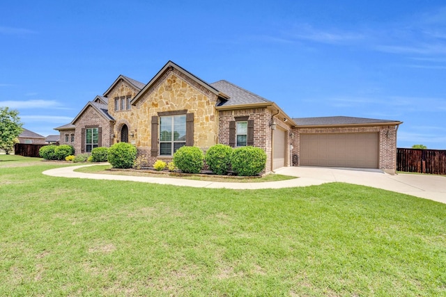 102 Willowbrook Dr, Waxahachie, TX 75165 - french provincial home with driveway, a garage, brick siding, and roof with shingles