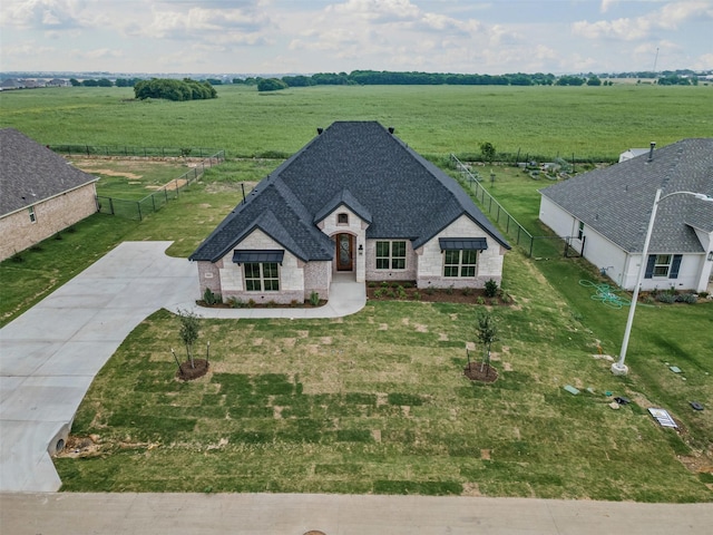 11612 Panther Dr, Godley, TX 76044 - view of front of property with concrete driveway, a view of rural / pastoral area, brick siding, a shingled roof, and stone siding