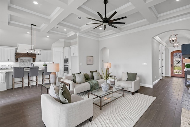 11612 Panther Dr, Godley, TX 76044 - living room featuring arched walkways, coffered ceiling, ceiling fan, dark wood finished floors, and beamed ceiling