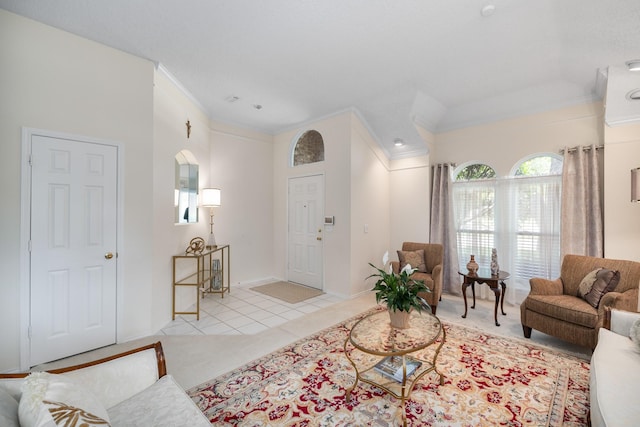 living room featuring ornamental molding and light tile patterned floors