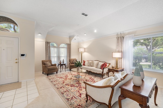 living room with ornamental molding, light tile patterned floors, baseboards, and recessed lighting