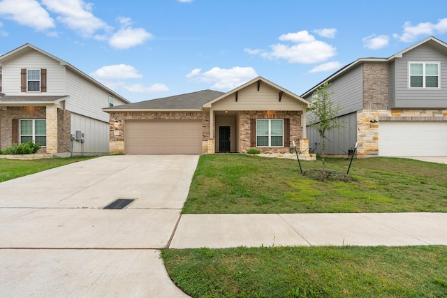 view of front of home featuring driveway, an attached garage, a front yard, and brick siding